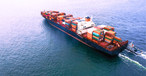 Cargo ship carrying containers in ocean