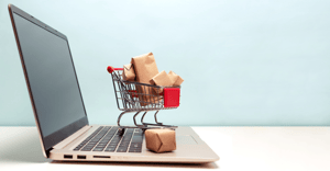 Retail Peak Season: Shopping Cart and Laptop